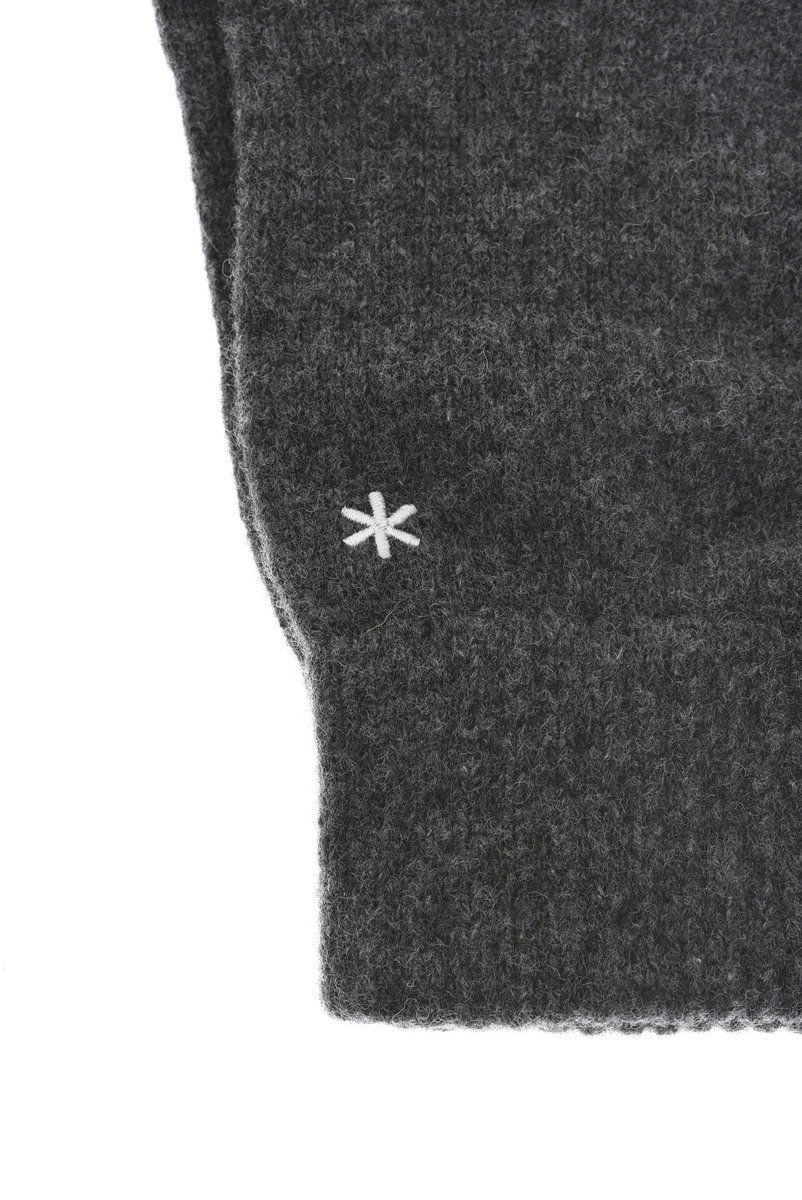 Premium Photo  Knitting gloves made of gray wool. top view.